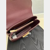 TEEN NINO BAG IN SMOOTH SATINATED CALFSKIN WITH ENAMEL CLOSURE