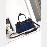 Prada Bonnie small denim and leather handbag 1BA486