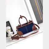 Prada Bonnie small denim and leather handbag 1BA486